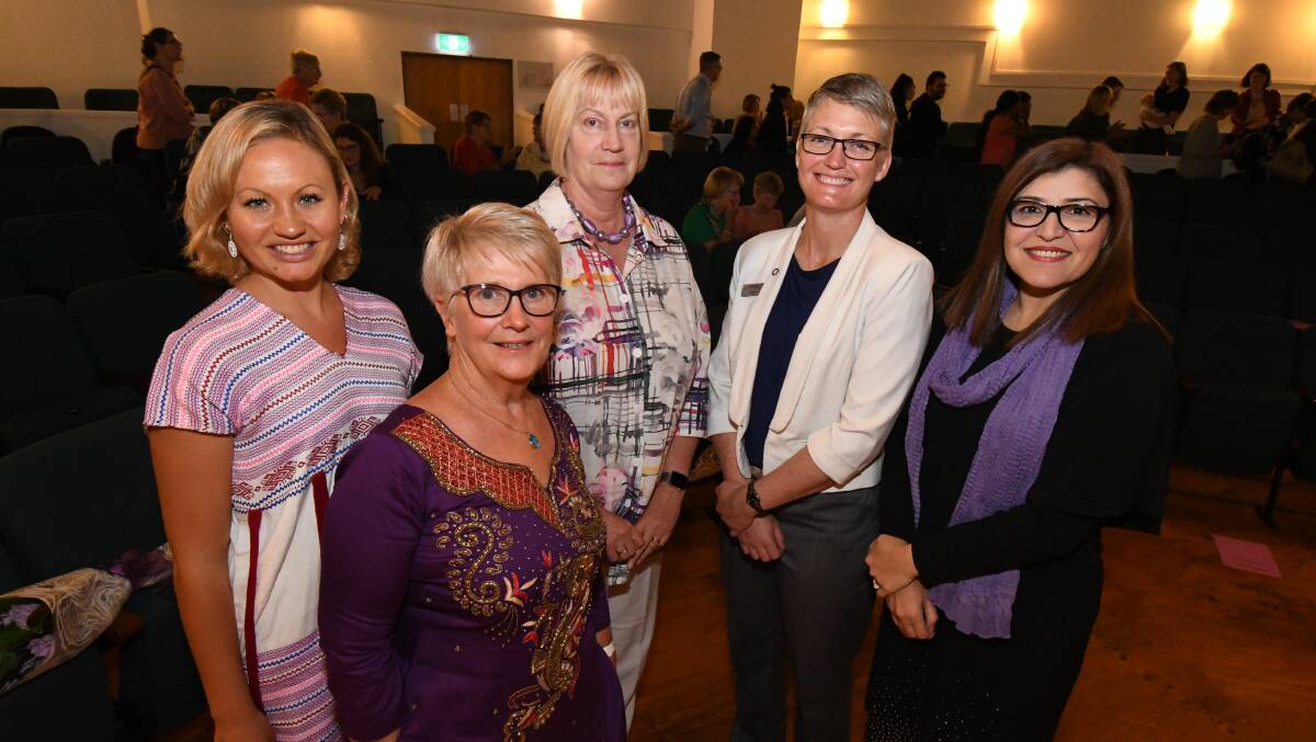 IN IT TOGETHER: KJ Riles, Mary Brell OAM, Lois Willing, Joanne McRae and Bushra Aman at a previous International Women's Day lunch. Photo: Jude Keogh