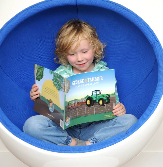 REASON TO READ: George Kain finds a comfy spot to read a George the Farmer book. Kids have the chance to win great George the Farmer prize packs at the field days.