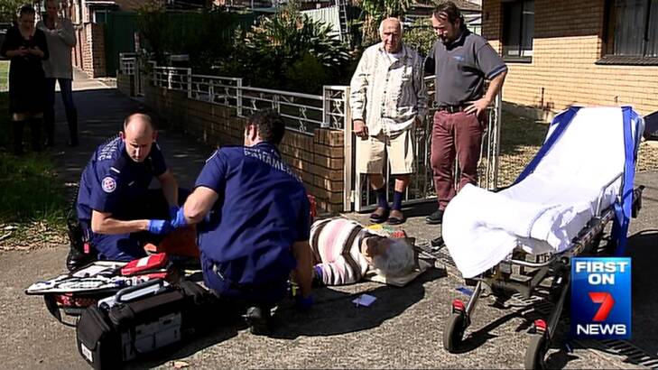For one woman, a television news crew arrived before a long overdue ambulance. Photo: Seven News