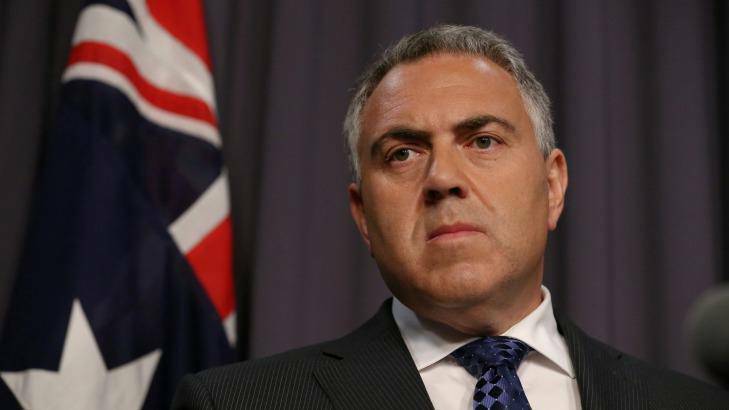Budget blowout: Treasurer Joe Hockey addresses the media during the release of the Mid-Year Economic and Fiscal OUtlook at Parliament House. Photo: Alex Ellinghausen