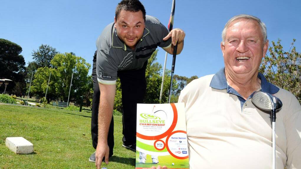 Jake O Brien from Dubbo Golf Club with Ivor Trapman, who is organising this year s Bullseye Championships. Photo: BELINDA SOOLE