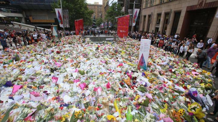 The floral tributes left at Martin Place in honour of the victims.