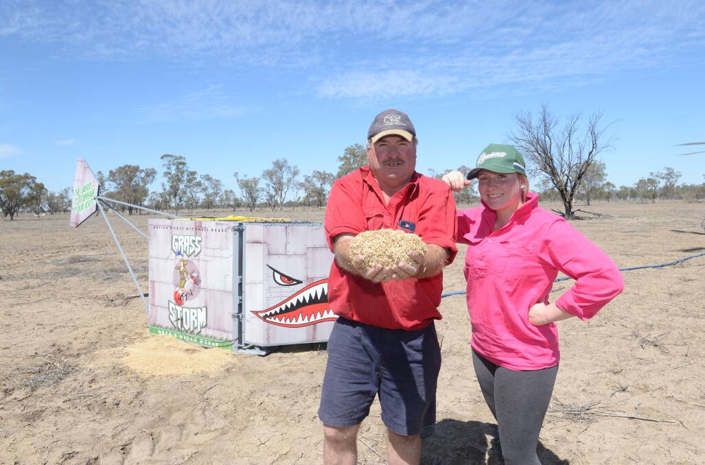 Greg Weber and his daughter, Elizabeth, 20, Weber Farming, “Fairlands”, Walgett, with their "Grass Storm", designed as an aerial seeder to be used to spread Mitchell grass seed from a helicopter.
