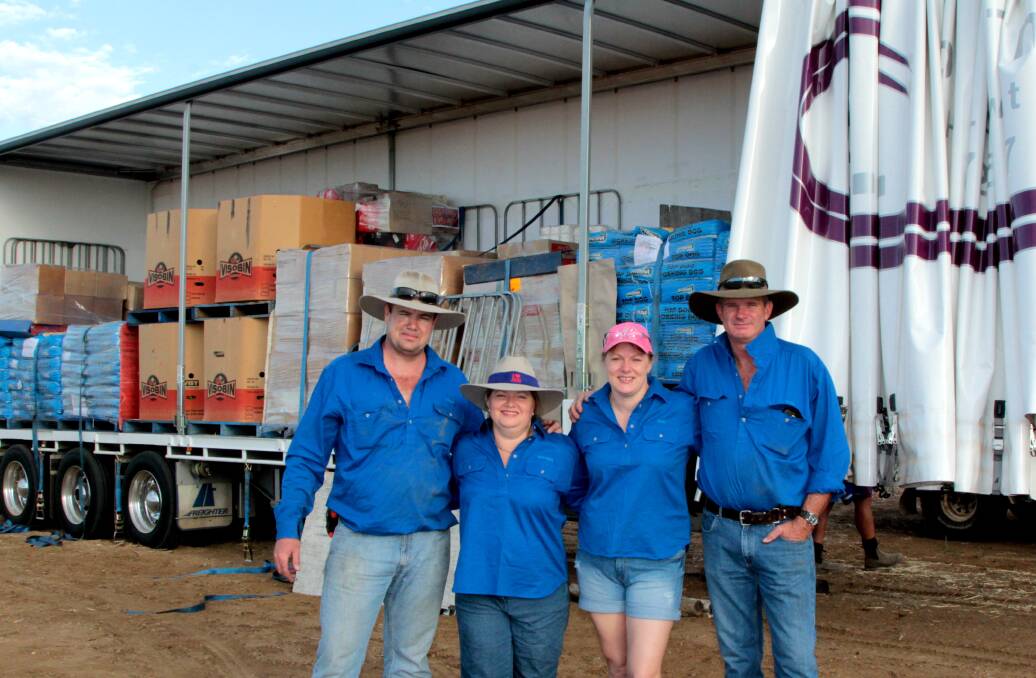 Culture of giving: Drought Angels Natasha Johnston and Nicki Blackwell, pictured with Steele Johnston and Peter Gailey, ready to distribute. Pictures: Sally Cripps.