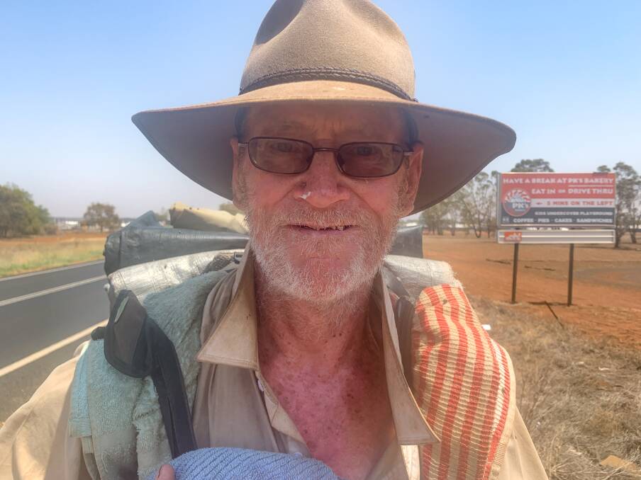 SWAGMAN: John Cadoret has been wandering the highways of eastern Australia for more than 40 years, becoming a regional icon after his first television appearance on Australian Story in 2004. Photo: WILLIAM OWENS