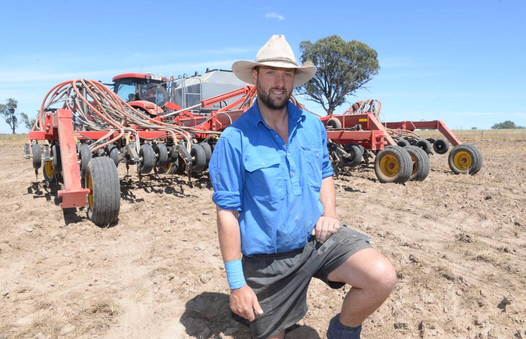 Nick Lyons with his 360-tyne Bourgault 3320 Paralink Hoe Drill with a Gason air-seeder sowing millet in a 30 hectare paddock at Mt Bodangora, near Wellington.