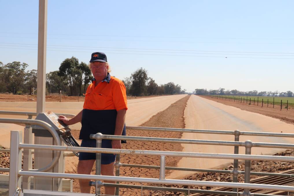 WORLD CLASS: Chairman of the Trangie Nevertire Irrigation Scheme Jim Winter with the channel on his property. Photo: ZAARKACHA MARLAN
