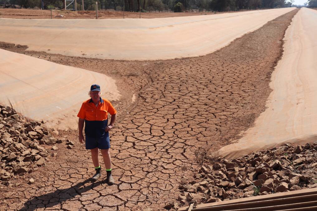 WORLD CLASS: Chairman of the Trangie Nevertire Irrigation Scheme Jim Winter with the channel on his property. Photo: ZAARKACHA MARLAN