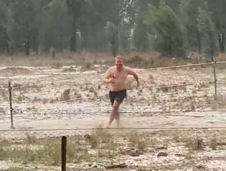 Celebrate: A video of Dubbo's Ben Goatcher running through the rain has been shared on social media more than one thousand times.


