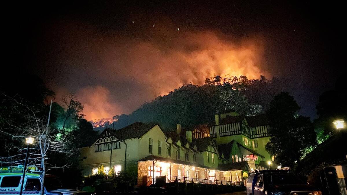 BLAZE: The historic Caves House has been saved from a bushfire. Photo: SUPPLIED 