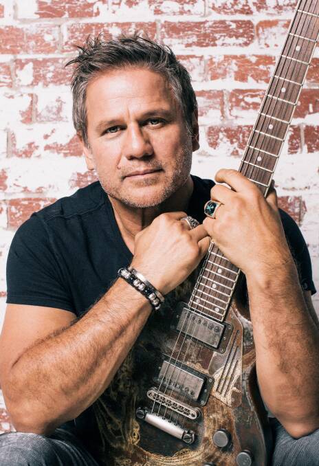 Signing for farmers: Singer Jon Stevens (pictured) penned the song Rain Down On Me which he offered to drought charity Rural Aid. Photo: Supplied. 