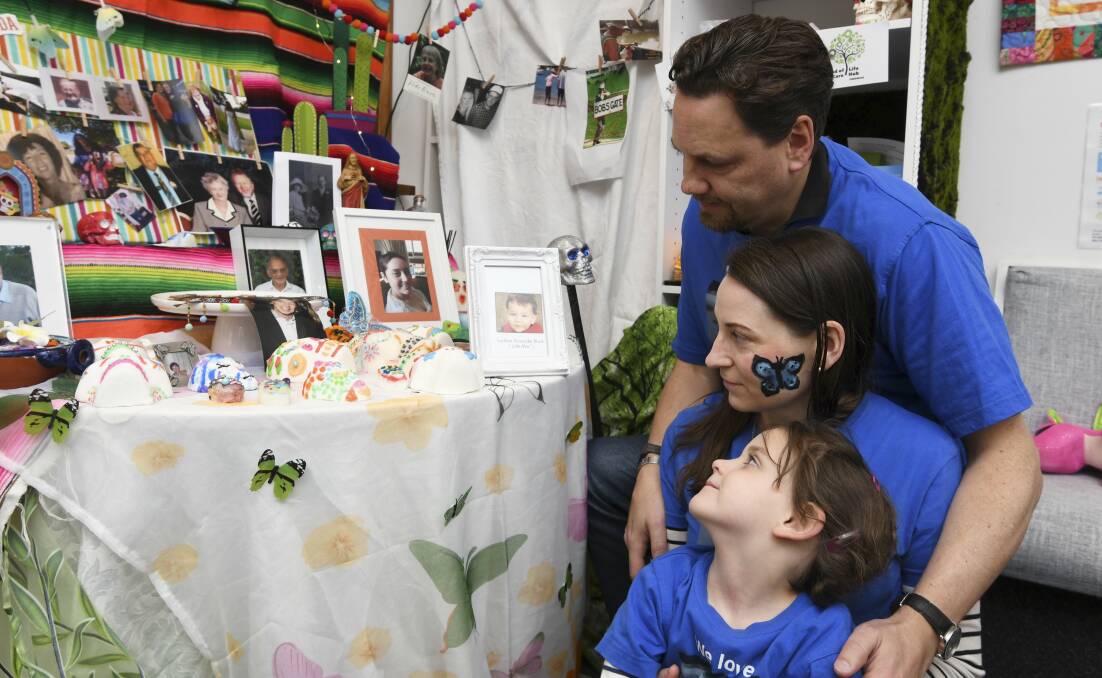 REFLECT: Tim and Angela Black, with five-year-old daughter Ashley take comfort in remembering their son in a bright, fun event. Picture: Lachlan Bence