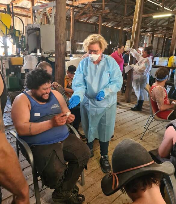 Shearing shed turned into a COVID vaccine clinic at Bangate Station as the Royal Flying Doctor Service administer Pfizer shots to shearers. Photo: Muddy's Quality Shearing.