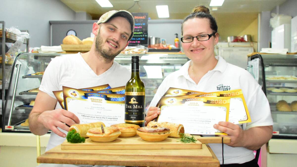 Tom and Emily Elkins with their award winning pies and sausage rolls. 