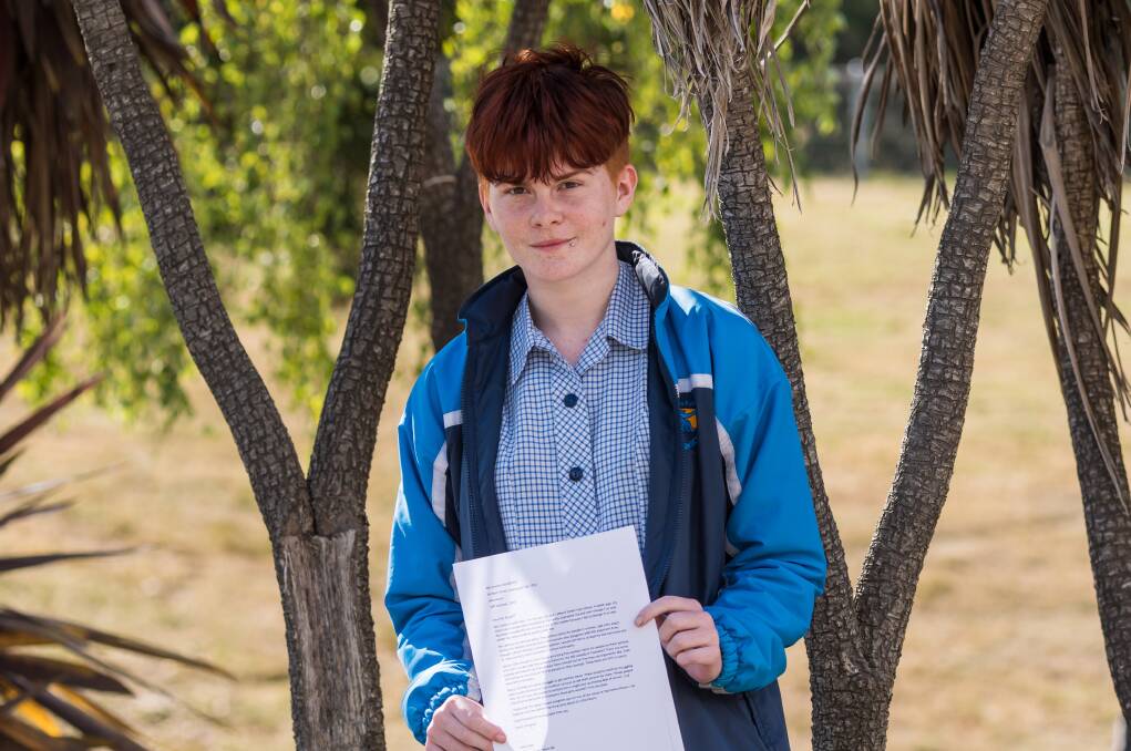 Exeter High School student Layla Seen, who is 14-years old, with the letter she wrote to the deputy premier. Picture: Phillip Biggs