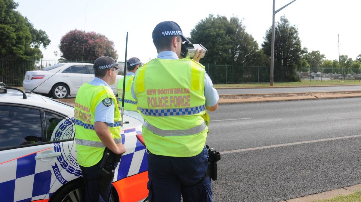 On the lookout: Police will be out in force over the Australia Day long weekend to ensure all drivers are sticking to the rules. Photo: FILE