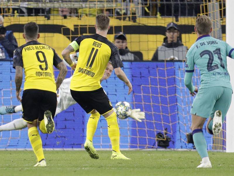 Barcelona goalkeeper Marc-Andre ter Stegen saved the second-half penalty of Dortmund's Marco Reus.