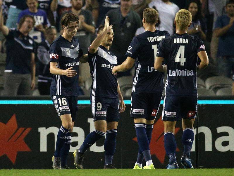 Melbourne Victory's Kosta Barbarouses bagged two goals against Brisbane Roar.