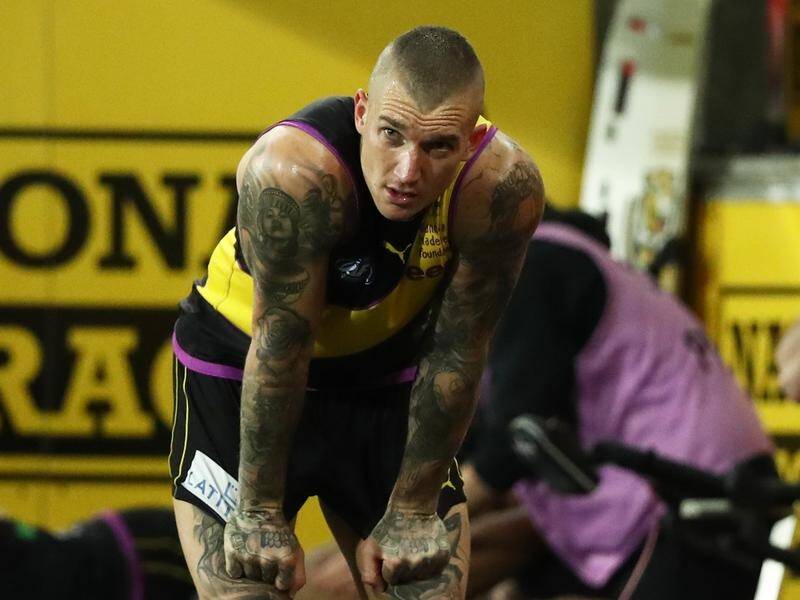 Dustin Martin will remain in Queensland with Richmond despite his AFL season being ended by injury.