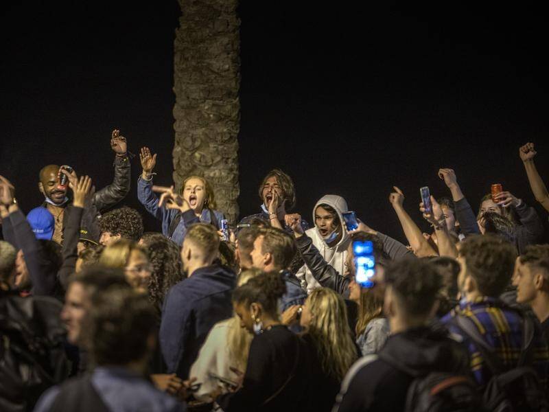 People danced on beaches in Barcelona, Spain, as coronavirus restrictions ended.