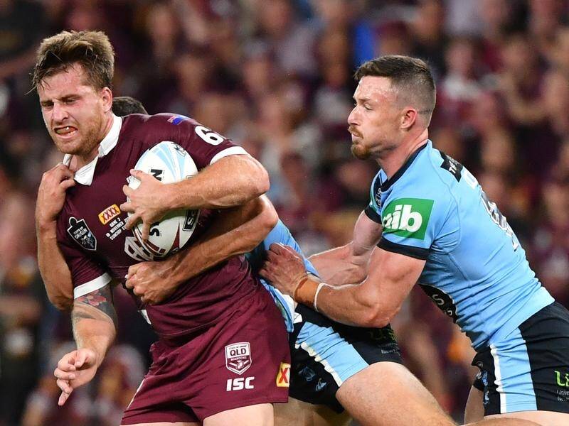 Cameron Munster was outstanding for Queensland as they clinched State of Origin with a 20-14 win.