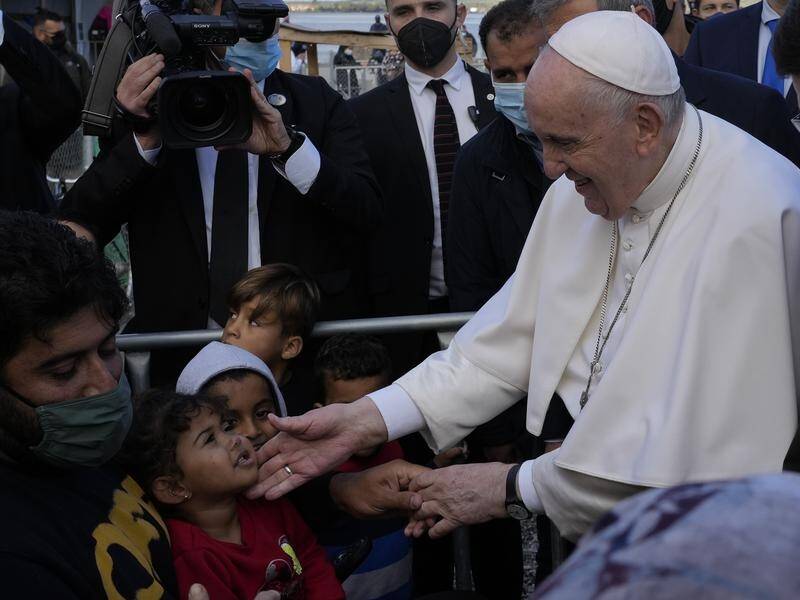 Pope Francis has visited asylum seekers at a refugee camp on the Greek island of Lesbos.