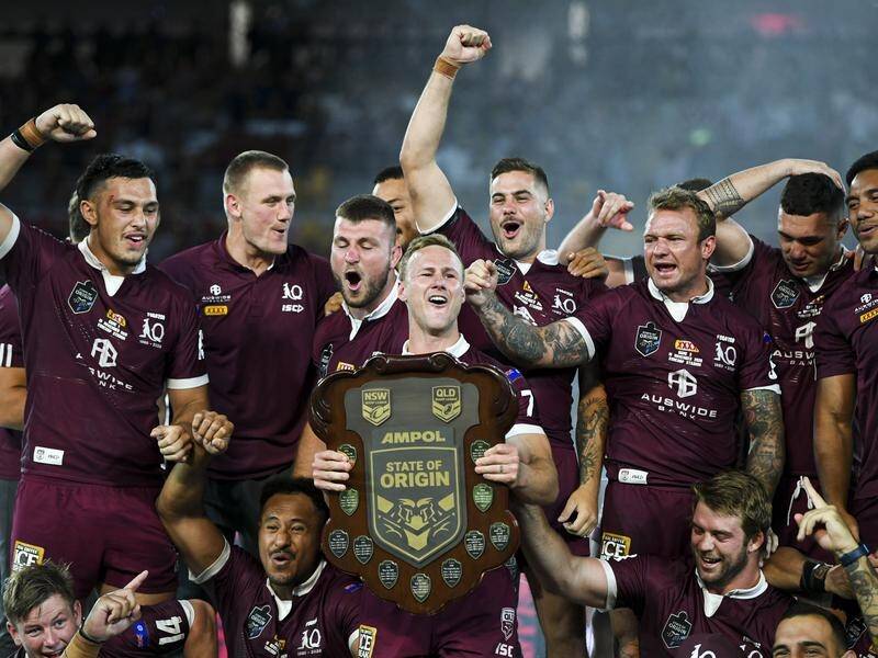 Daly Cherry-Evans lifts the 2020 State of Origin trophy with Queensland's "worst-ever team".