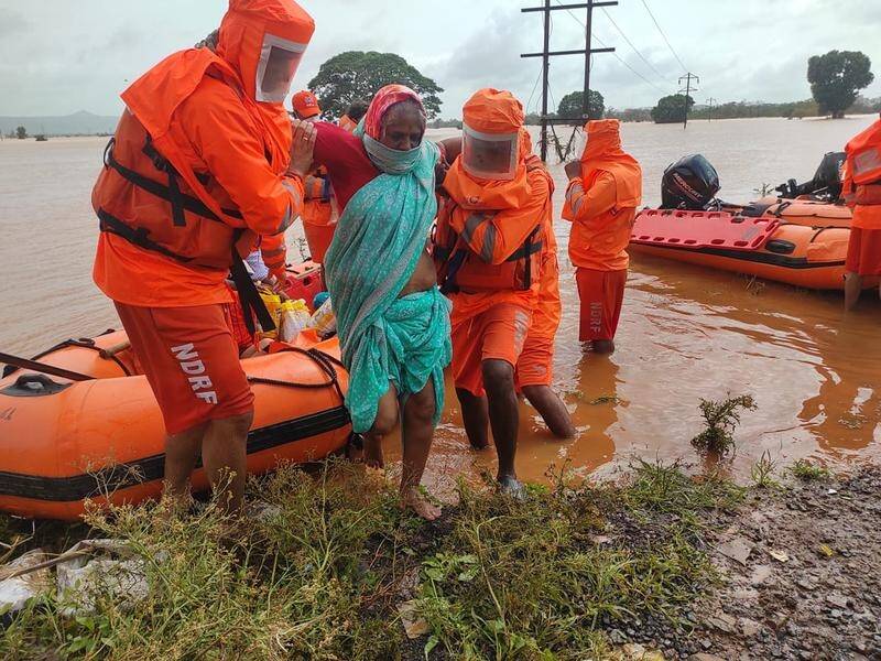 More than 100 lives have been lost to seasonal monsoon landslides and flooding in western India.