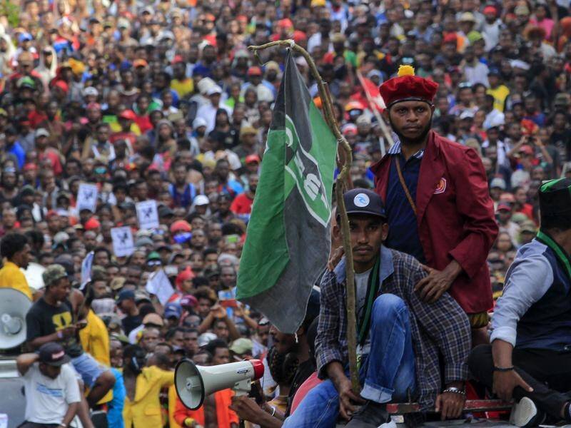 Papuan independence leader Victor Yeimo has been arrested over claims he fomented unrest in 2019.