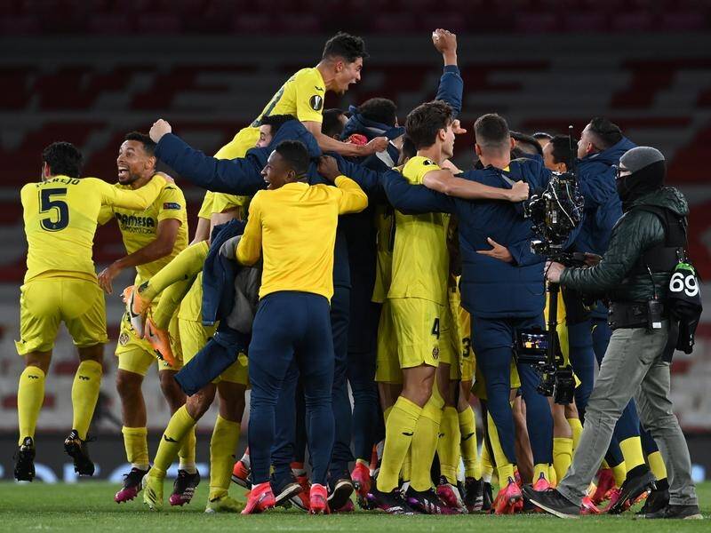 Villarreal players celebrate reaching the Europa League final after drawing at Arsenal.