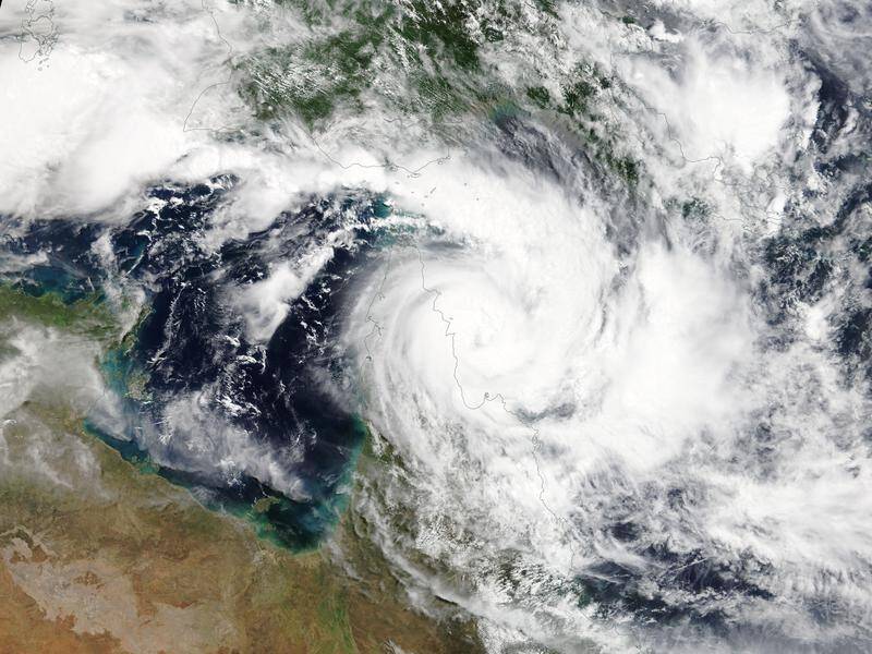 A satellite photo shows the fury of Cyclone Trevor as it approaches Top End communities.