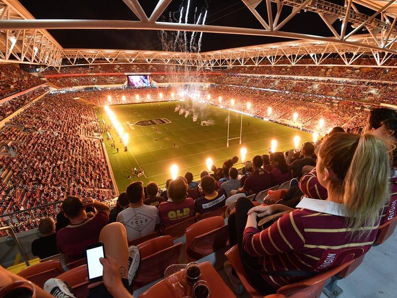 Almost 50,000 fans packed into Suncorp Stadium to watch the Maroons and Blues do Origin battle.