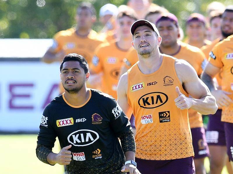 Brisbane have kept Anthony Milford (l) but Corey Oates is out of the team to play the Warriors.