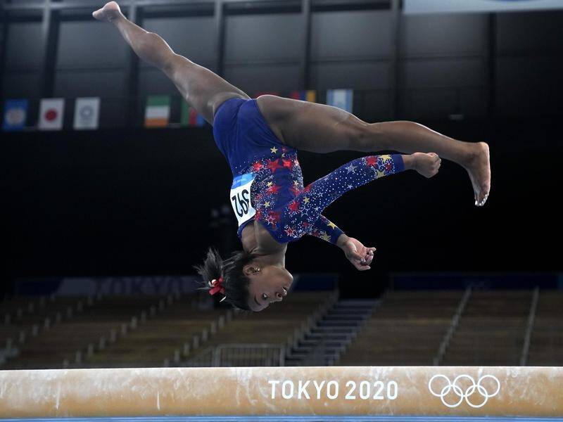 American star Simone Biles heads the leaderboard in the women's gymnastics all-around competition.