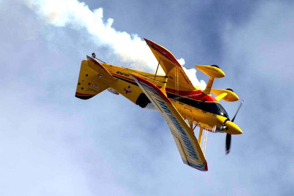 SKY HIGH: One of the displays during the air show at the inaugural Soar, Ride and Shine event at Bathurst Airport in 2016. Photo: JOHN GRIFFIN 091917plane